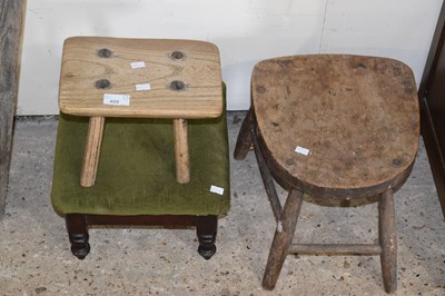 Lot 409 - A small milking stool and another with green...
