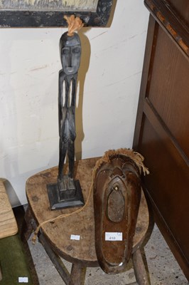 Lot 410 - A small stool, carved wood wall mask and a...