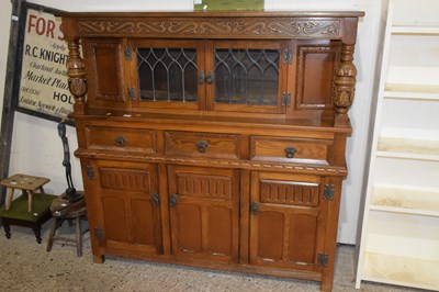 Lot 411 - A  reproduction oak court cupboard