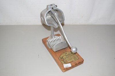 Lot 516 - A vintage instant juice press