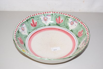 Lot 517 - Two pottery fruit bowls and a table top...