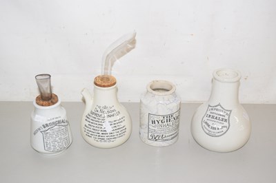 Lot 554 - A group of four vintage inhalers