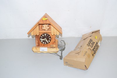 Lot 559 - A modern pine framed cuckoo clock