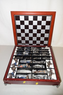 Lot 565 - Modern resin chess set and board