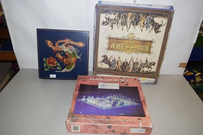 Lot 577 - A glass chess set together with two others (3)