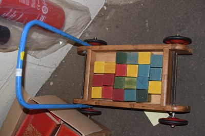 Lot 581 - A child's pull along truck of building blocks