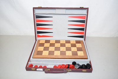 Lot 615 - A travelling games compendium