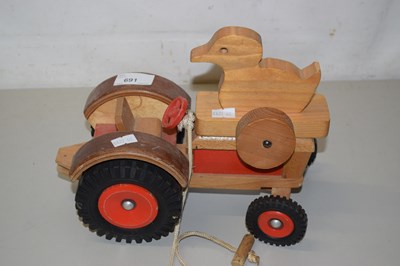 Lot 691 - A child's toy wooden tractor