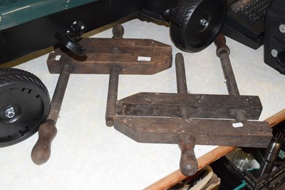 Lot 698 - Two vintage wooden clamps