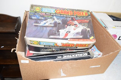 Lot 712 - A box of mixed items to include Scalextric