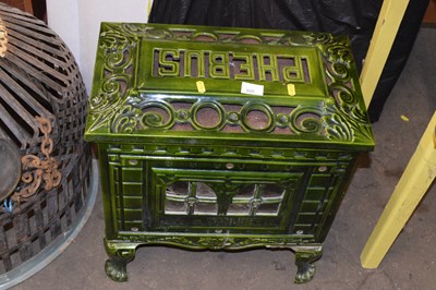 Lot 800 - A French Phebus green enamel finish stove