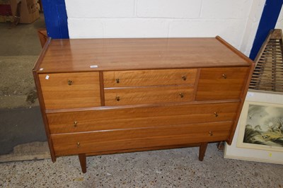 Lot 394 - A retro mid Century teak seven drawer chest