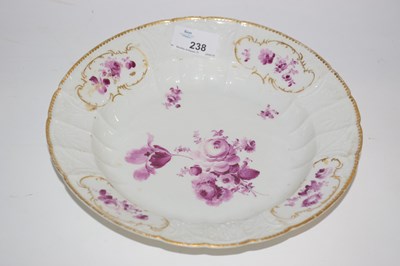 Lot 238 - A Meissen dish painted in puce with flowers,...