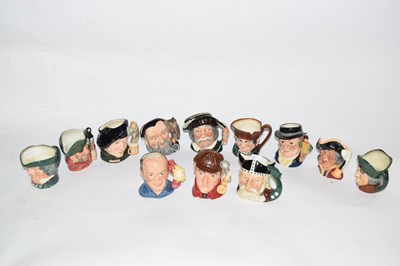 Lot 269 - A collection of small Royal Doulton character...