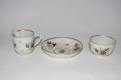 Lot 303 - A Worcester porcelain trio with blue and gilt...