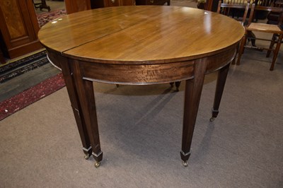 Lot 368 - A Georgian Revival mahogany circular two...