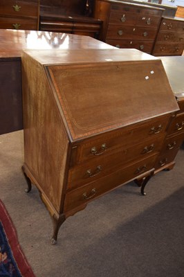 Lot 379 - An Edwardian mahogany cabriole leg bureau with...