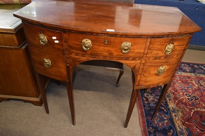 Lot 387 - Small Georgian mahogany bow front sideboard...