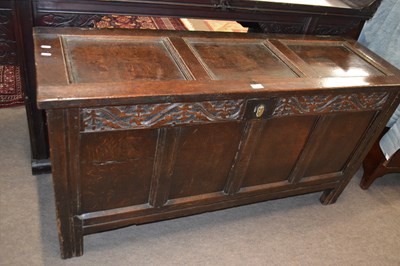 Lot 403 - An 18th Century oak coffer with hinged...