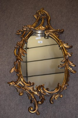 Lot 405 - An 18th Century gilt wood wall mirror, the...