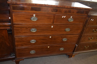 Lot 409 - A late Georgian mahogany chest of two short...
