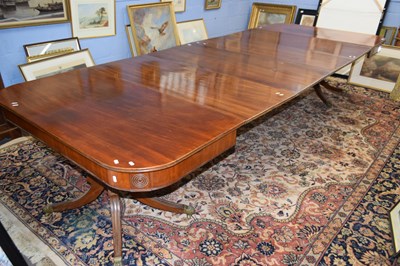 Lot 445 - Large George III mahogany extending dining...