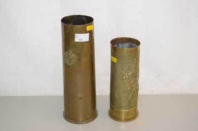 Lot 13 - A brass shell case bearing the crest of the...