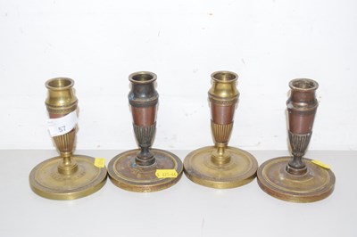 Lot 57 - A set of four small 19th Century bronze and...