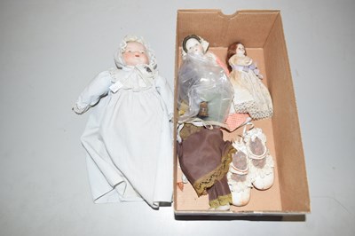 Lot 82 - A group of small porcelain headed dolls and...