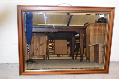 Lot 264 - Modern bevelled wall mirror in dark wood frame