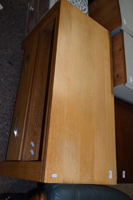 Lot 309 - A modern oak television stand