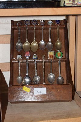 Lot 508 - Collectors teaspoon and rack