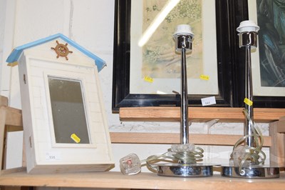 Lot 535 - Pair of table lamps and a beach hut styled...