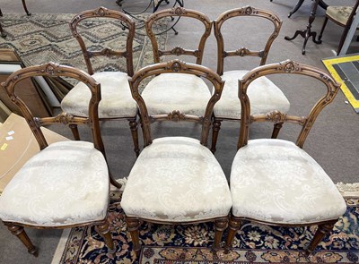 Lot 447 - A set of six late 19th Century walnut dining...