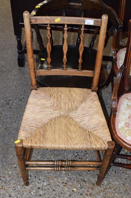 Lot 335 - A 19th Century spindle back and rush seated...