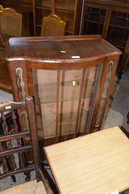 Lot 337 - A retro bow front walnut veneered china...
