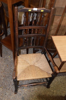 Lot 338 - A 19th Century spindle back and rush seat...