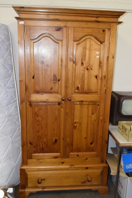 Lot 696 - Modern pine wardrobe