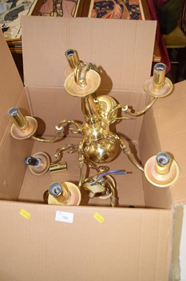 Lot 789 - A modern brass finish five branch chandelier...